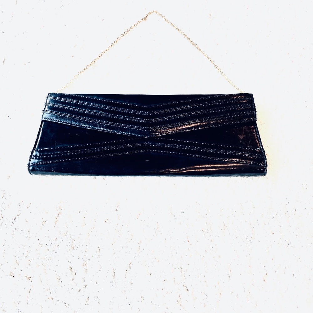 BCBGMaxAzria Black Quilted Envelope Clutch with Gold Chain